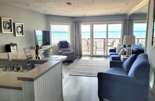 Traverse City Casa | Beachside 213 with Pool Hot Tub and Private Deck overlooking East Bay