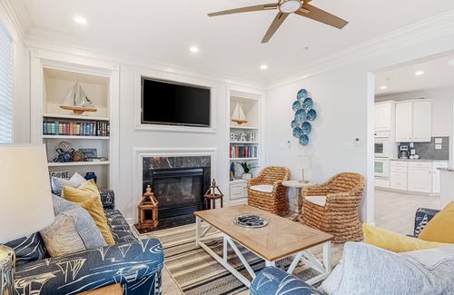 Sunset Island Casa | Beachside home with a gas fireplace, washer/dryer, pools, dock, & fitness room