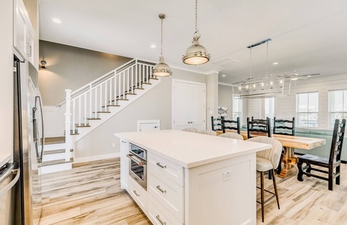 Beachside Village Casa | Beachside Village ocean-view home with pool, multiple balconies & EV charger