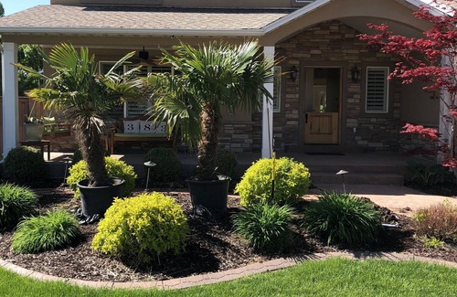 River Bottoms Casa | Beachy Home in Provo. Large deck with builtin hot tub, Fire pit, Palapa