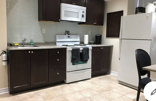 Lisgar Apartamento | Hermoso apartamento de 1 dormitorio en planta baja.