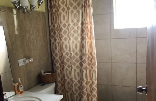 Estate Sion Hill Apartamento | Hermoso apartamento de 2 dormitorios y 2 baños completos en la isla