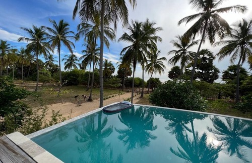Koralai Pattu North Casa | Beautiful 4-bedroom villa in welcoming Pasikudah with AC, WiFi. Enjoy your stay
