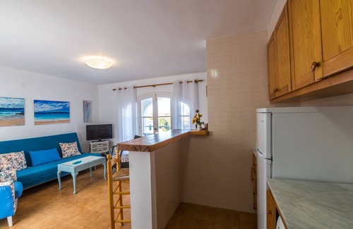 Arenal d'en Castell Apartamento | Hermoso apartamento con Wi-Fi, piscina, terraza y vista al mar