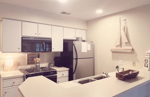 Sea Trail Casa | Beautiful and spacious first floor Sunset Beach villa in Sea Trail! Bikes & gear