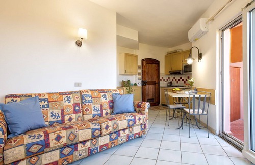 Canneddi Apartamento | Hermoso apartamento para 4 personas con WIFI, A/C, piscina, TV, terraza y mascotas permitida