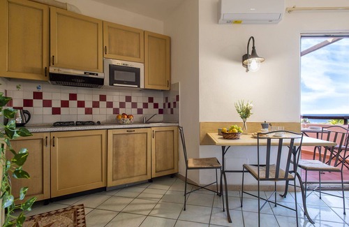 Canneddi Apartamento | Hermoso apartamento para 4 personas con WIFI, A/C, piscina, TV, terraza y mascotas permitida