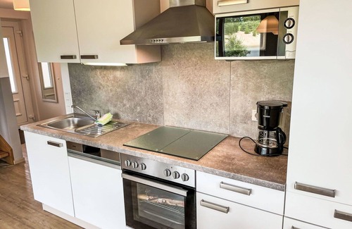 Hechthausen Casa | Acogedor apartamento en villa para 6 personas con piscina, WIFI, TV, terraza y mascotas permitida