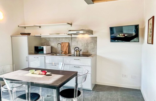 Dervio Apartamento | Hermoso apartamento con piscina, WIFI, A/C, TV, patio, vista panorámica y aparcamiento