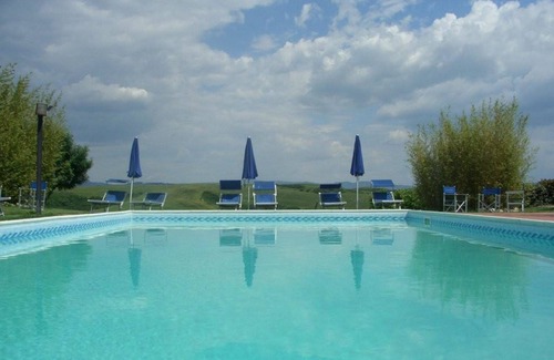 Peccioli Villa | Bonito apartamento en villa para 3 personas con WIFI, piscina, vista panorámica y aparcamiento