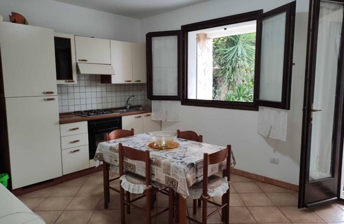 Porto Pino Apartamento | BEAUTIFUL APARTMENT IN VILLA WITH SEA VIEW