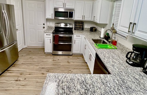 Golden Glades - The Woods Casa | Beautiful Beach House with heated private pool