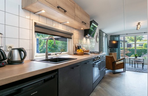 Hulshorst Chalet De Esquí | Beautiful chalet with wellness on the Veluwe