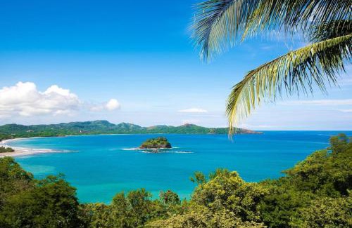 Playa Flamingo Casa | Beautiful Condo in Peaceful Cliffside Location with a Private Balcony & Stunning Ocean and Mountain Views