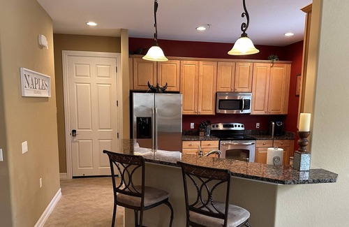 Ole Condominio | Beautiful Condo in Ole' section of Lely Resort - Resort Style Pool & Dining