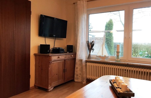 Dornumergrode Apartamento | apartamento hermoso, acogedor y familiar con un gran jardín