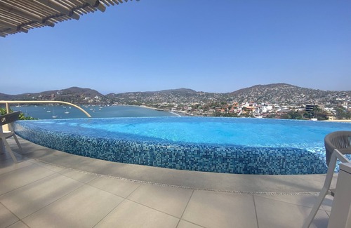 Playa la Madera Condominio | Beautiful Elegant New 1-bedroom condo right on/above Madera Beach