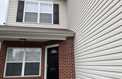 Charlotte Casa | Beautiful end unit vacation home for short term rental with adequate sunlight.