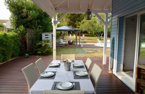 Meschers-sur-Gironde Villa | HERMOSA CASA ESTILO DE MADERA TROPICAL con PISCINA CALEFACTADA a 28 ° + REFUGIO> PLAYAS 80