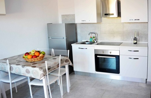 Porto Pozzo Apartamento | Luminoso trilocale con vista mare - Residence Eolo