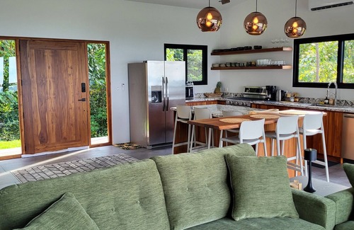 Ballena Casa | Beautiful new home with wrap around views of the ocean and two waterfalls