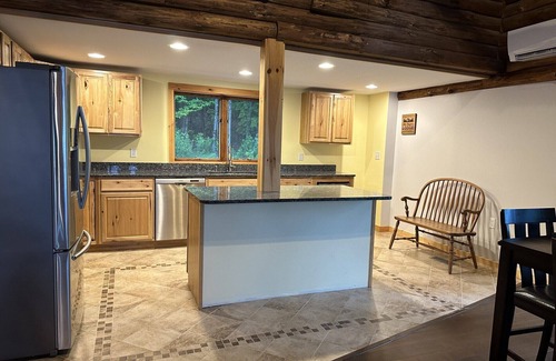 Ellsworth Casa | Beautiful private beach area within steps from the modern updated log home