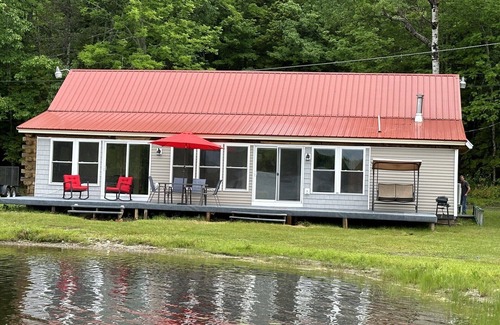 Ellsworth Casa | Beautiful private beach area within steps from the modern updated log home