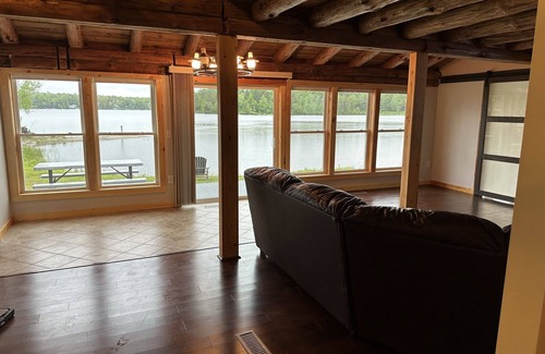 Ellsworth Casa | Beautiful private beach area within steps from the modern updated log home