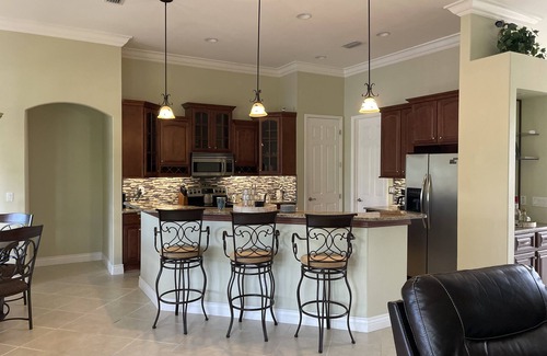Fort Myers Casa | Beautiful ranch home on quiet canal with ocean access and spa.