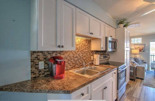 Saint James City Condominio | Beautiful SJC Island Condo w/heated pool on main canal, great fishing!