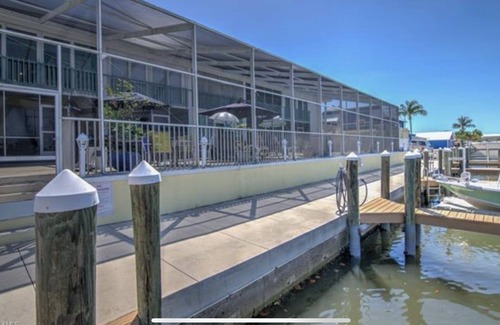 Saint James City Condominio | Beautiful SJC Island Condo w/heated pool on main canal, great fishing!