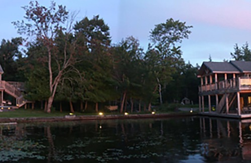 Muskoka Lakes Cabaña | Hermosa cabaña de 6 dormitorios con vista al atardecer y casa de botes en el lago central de Rosseau