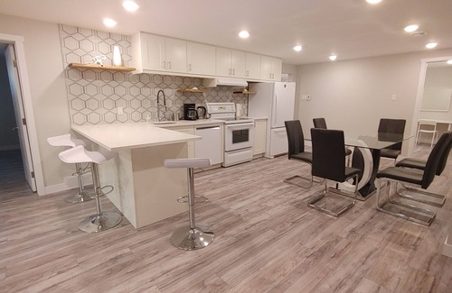 Southwest Calgary Casa | Beautiful two bedroom and an office lower level suit