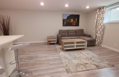Southwest Calgary Casa | Beautiful two bedroom and an office lower level suit