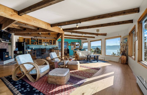 Dayton Casa | Beautiful & unique home with large windows and deck that overlook Flathead Lake