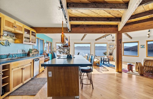 Dayton Casa | Beautiful & unique home with large windows and deck that overlook Flathead Lake