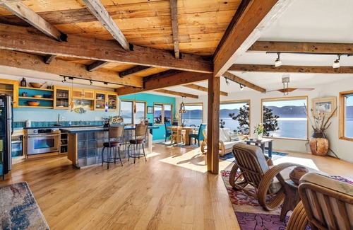 Dayton Casa | Beautiful & unique home with large windows and deck that overlook Flathead Lake