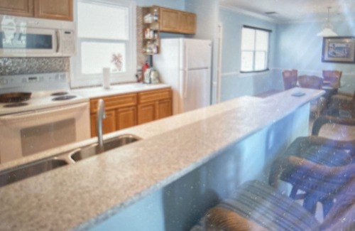Wheeland Settlement Condominio | Condominio actualizado de 3 dormitorios espacioso, piscina, jacuzzi, playa privada, recientemente renovado