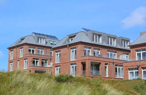 Horum Apartamento | Beautiful vacation apartment with sunny south-facing terrace - only 100 m to the North Sea beach!