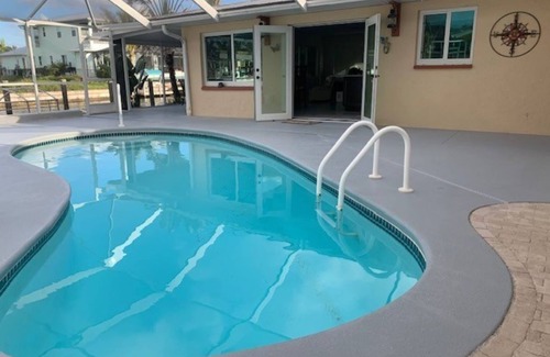 Saint James City Casa | BEAUTIFUL WATERFRONT HOME WITH SALTWATER POOL AND CANAL ACCESS