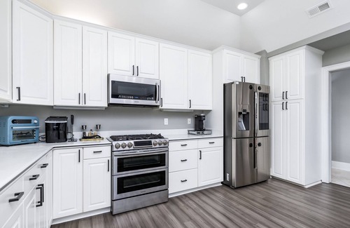 Rock Hill Casa | Beautiful Waterfront Home with abundant outdoor seating, pool, hot tub, grill