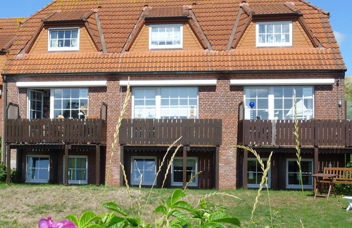 Loog Casa | Hermosa, bien dividida casa justo en las dunas, marismas vista, jardín