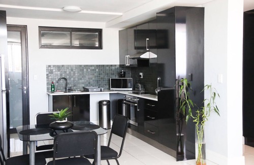 Windhoek Central Apartamento | Bellamente amueblado, en el corazón de Windhoek.