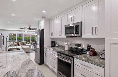Shell Harbor Casa | Beautifully newly redesigned canal front pool home minutes to beach! NEW!