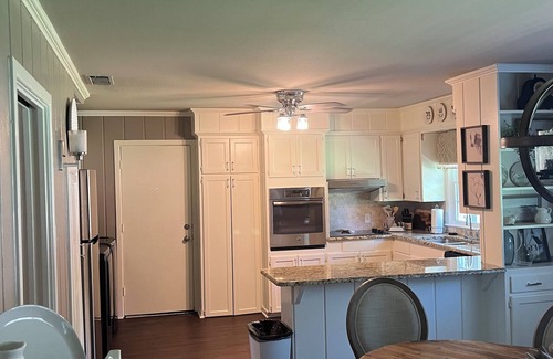 Tyler Casa | Beautifully updated 3bedroom 2 bath home with a large glassed in sunroom.