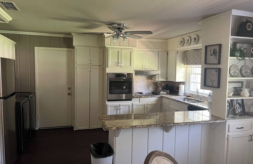 Tyler Casa | Beautifully updated 3bedroom 2 bath home with a large glassed in sunroom.