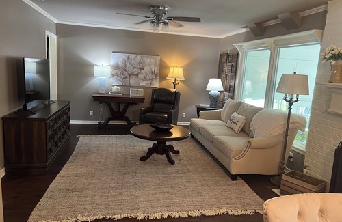Tyler Casa | Beautifully updated 3bedroom 2 bath home with a large glassed in sunroom.
