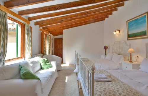 Banyalbufar Cama Y Desayuno | Alojamiento y desayuno 'Can Busquets Suite' con vistas al mar, Wi-Fi y aire acondicionado