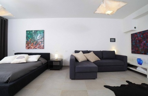Palazzolo dello Stella Cama Y Desayuno | Bed and Breakfast Loggia degli Artisti 'Habitación Superior' con Piscina Compartida y Aire Acondicionado
