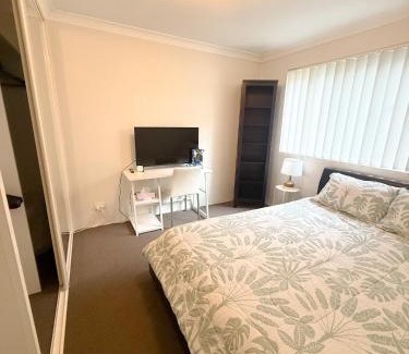 Kirrawee Casa | Bedroom in Sydney AU